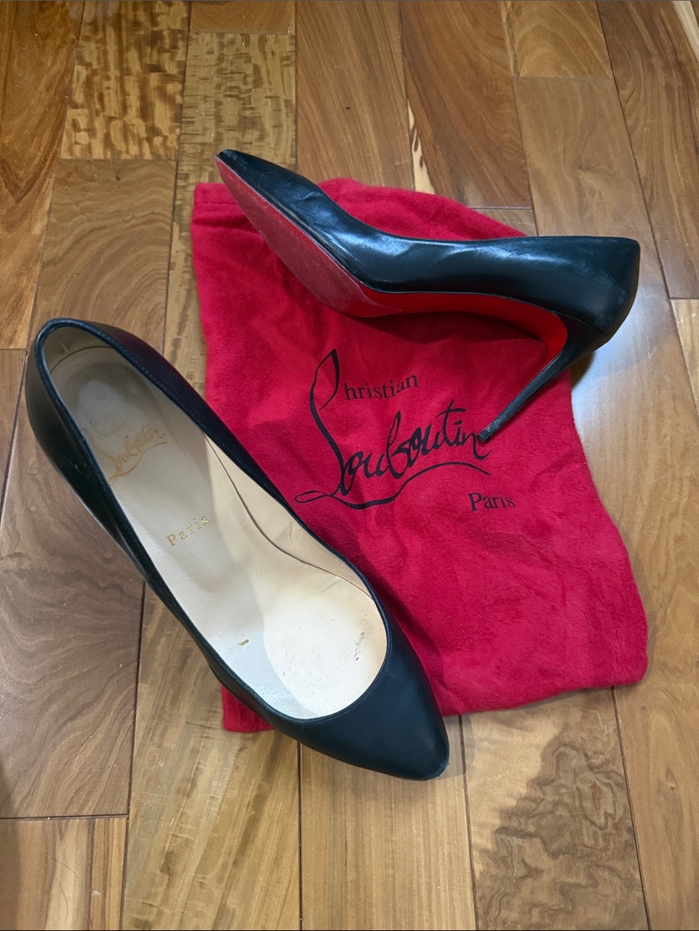 Christian Louboutin Black Leather Pointed Pumps with Red Sole